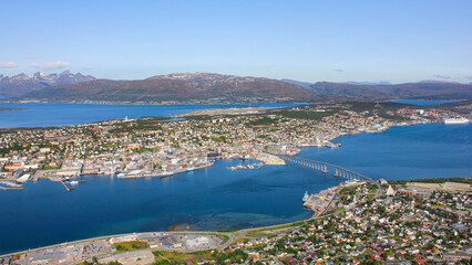 Aerial view of Tromso landscape in a sunny summer day, Norway. Arctic northern city travel destination for vacations, cruise trips and exploring.