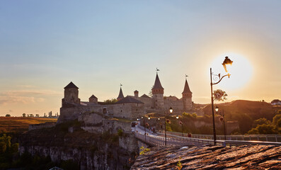Dramatic view on the castle in Kamianets-Podilskyi in spring.