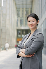 Confident Young Professional Woman in Urban Setting