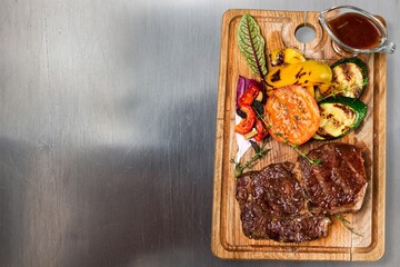 Traditional roast meat on wooden board