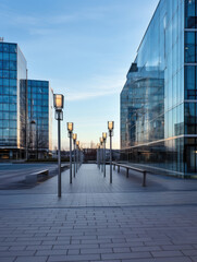 Modern Glass Office Buildings at Sunset Promenade