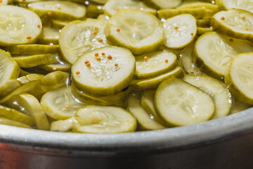 bread and butter dill pickle chips, with mustard seed and black papper, background