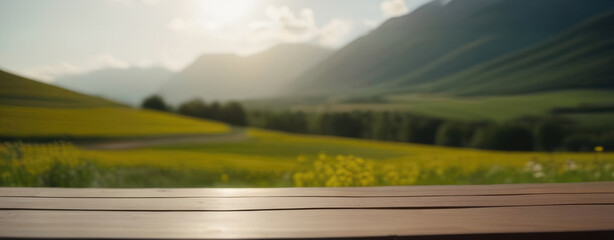Fototapeta premium Mockup blank wooden surface with blurred background of mountain landscape and flowering meadows on a sunny day. Template mockup for product demonstration. Space for design and text
