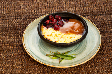 Blackberry dessert with fried cheese and caramel sauce - Typical Colombian gastronomy