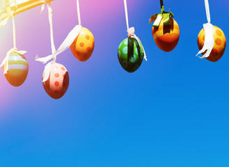 Egg shaped toys on the ropes background