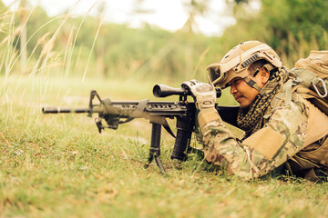 Fototapeta premium The soldier's courage is tested daily, as they face the harsh realities of war with a steadfast resolve that refuses to waver in the face of adversity.