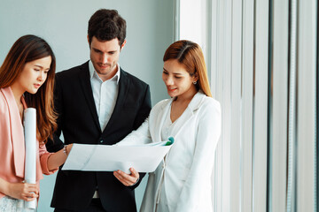 Businessman is in meeting discussion with colleague businesswomen in modern workplace office....