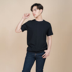 Young man posing in casual black t-shirt