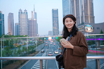 Young Woman Enjoying City Life at Twilight