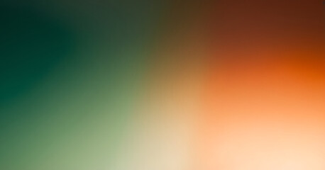 A softly blurred gradient background transitioning from deep teal to warm orange, reminiscent of a sunset