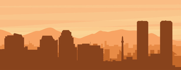 Brown panoramic city skyline poster with misty background buildings, sunrise, clouds and mountains of TIJUANA, MEXICO