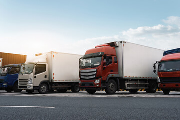 Commercial Fleet of Trucks Parked on Roadside