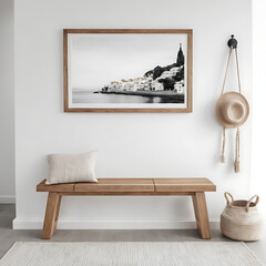 A tranquil, minimalist home interior. A natural wood bench adorned with patterned cushions sits below the artwork, complemented by 