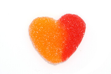 Peach jellies candy heart isolate on white

