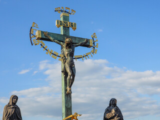 Beautiful bronze statue of the crucifixion of Jesus Christ. Statue of the Holy Cross with Calvary...
