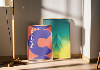 Mockup of two customized vertical picture frames on floor