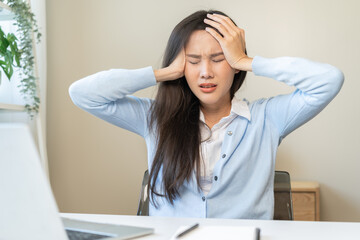 Stressed, exhausted asian young woman, girl pain from vertigo, having migraine symptoms headache,...
