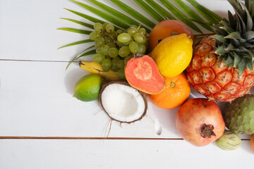 Summer mix of tropical fruits over white
