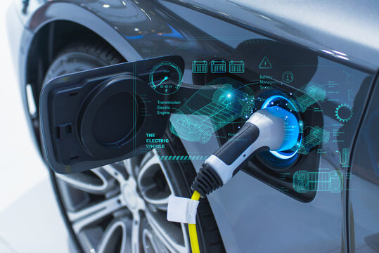 Close-up of an electric car being charged, with a futuristic digital interface showing vehicle and battery details.