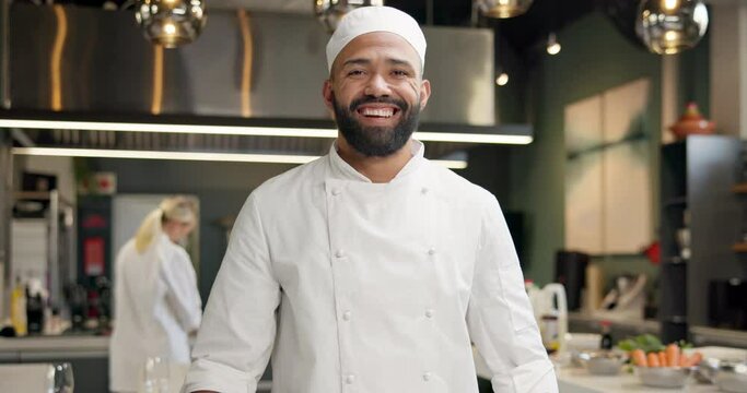 Man, face and chef in kitchen or laughing in culinary restaurant for funny joke, customer service or hospitality. Male person, hat and happy for fine dining cuisine or working, smile or professional