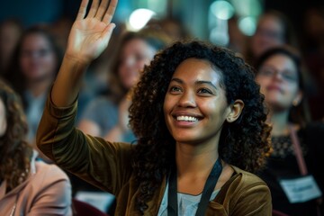 Young  Smiling Woman Raising Hand To Engaging Conference Audience