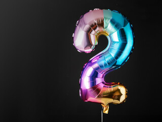 Number 2 shape. Helium balloon, rainbow colors. Separate on black background.