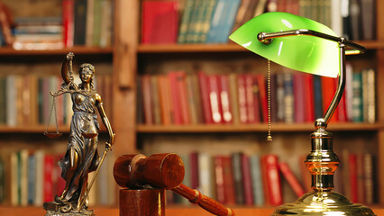Close-up of a lawyer or judge's workplace with a fimida on the table. Concept of legal law,...
