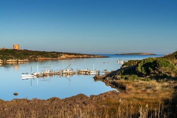view of the small Port of Sanitja on the rugged northern coast of Menorca island in Spain