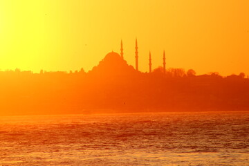 Istanbul background photo. Silhouette of Suleymaniye Mosque at sunset.