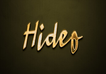 Old gold text effect of Japanese name Hideo with 3D glossy style Mockup.