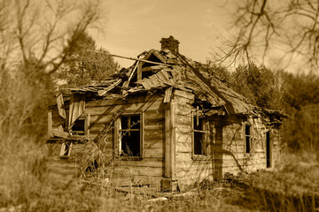 An old wooden house abandoned by residents, passing away life