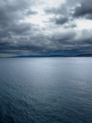 Cloudy Sky Over Calm Ocean