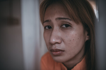 Portrait of women desperate to catch the iron prison,prisoner concept,thailand people,Hope to be...