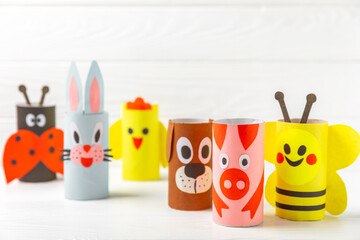 Toilet paper crafts on a colored background. Kids crafts made with toilet paper roll. DIY....