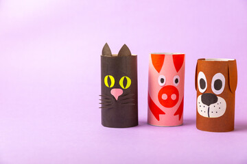 Toilet paper crafts on a colored background. Kids crafts made with toilet paper roll. DIY....