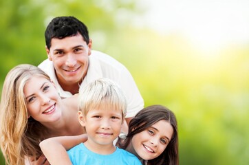 Obraz premium Happy young Family with children outdoor