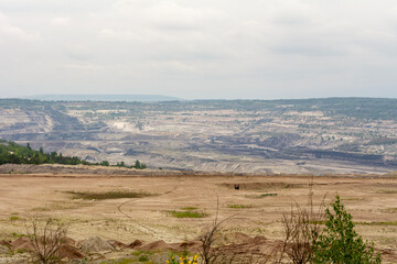 Obraz premium Coal-fired power plant and open-pit mine in Bełchatów, Poland.