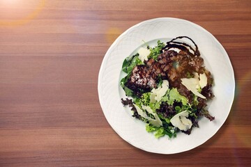 Grilled beef steak with fresh vegetables