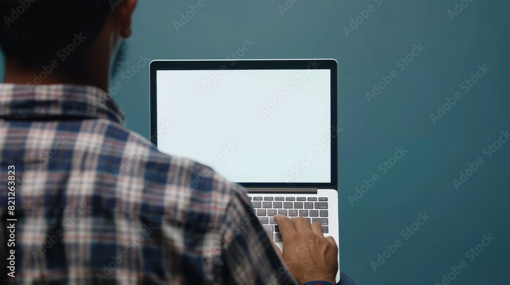 Poster professional man working on laptop: mockup screen display for business or technology concept. modern