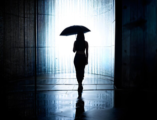 Silhouette of Seduction: An Erotic Woman with an Umbrella in a Monochrome Tunnel