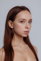 Fototapeta premium Healthy skin woman beauty hand manicure touching skin portrait natural make up. High quality photo