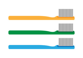 Cepillos de diente naranja, azul y verde.