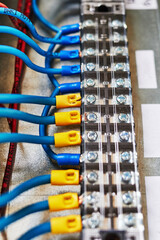 blue wires connected to the contact strip and relays.