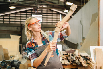 professional artisan carpenters woodworking team work together creatively, creative carpenter woman working workshop for wooden craft with wood tool at industry carpenter's shop, business of wood