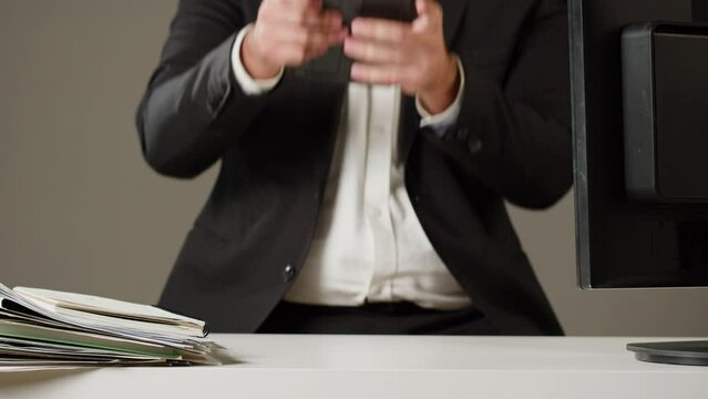 Aggressive man at work, Computer failure, error, stress at work concept. Mad impulsive crazy adult guy breaks down laptop, office worker breaking monitor and keyboard