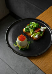 Caviar egg with toast and salad
