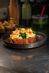 Bruschetta with omelet and shrimp