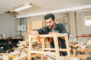 carpenter workshop with timber equipment and carpenter's shop tool, craft woodwork industry by professional craftsman person working in wooden occupation job to make a furniture from wood plank