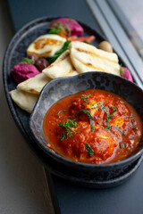 Mediterranean mix with halloumi, vegetables, and pita bread