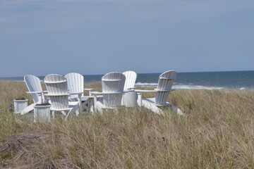 chairs on the beach for a gathering